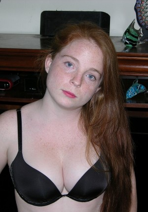 Redhead amateur Amelia first time nude pics showing off her fire red pussy hair image picture