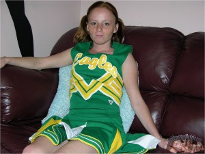 Super tiny teen cutie Alissa C takes off her cheerleader outfit to show her pussy