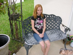 Super cute tiny redhead teen cutie Alissa C strips and poses on the couch