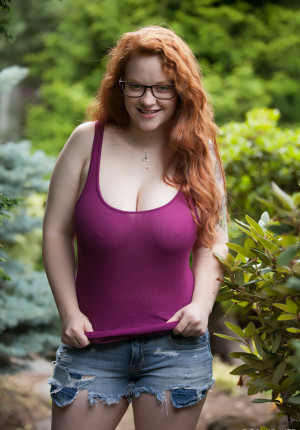 300px x 430px - Glasses wearing big tits redhead Kaycee Barnes flashing her boobs in the  woods - Nerd Nudes
