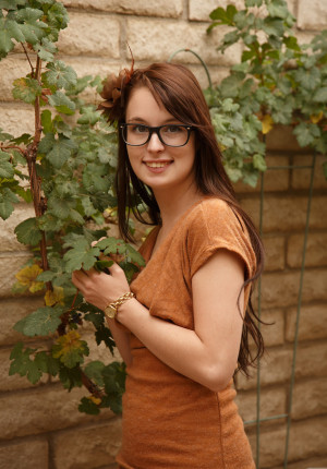 Super cute bespectacled brunette teen Pamela Aeris shows her small tits and panties in public