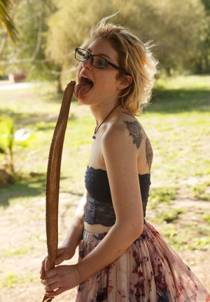 wpid-nerdy-blonde-kris-ekmard-posing-playfully-in-her-glasses6.jpg