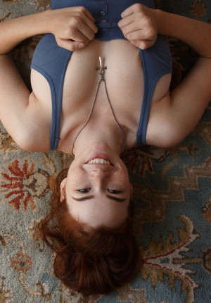 Adorable redhead Sabrina Lynn plays in her bodysuit teasing with her big boobs and sexy body