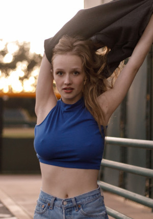 Redhead newcomer Giana Van Patten shows her big tits outside