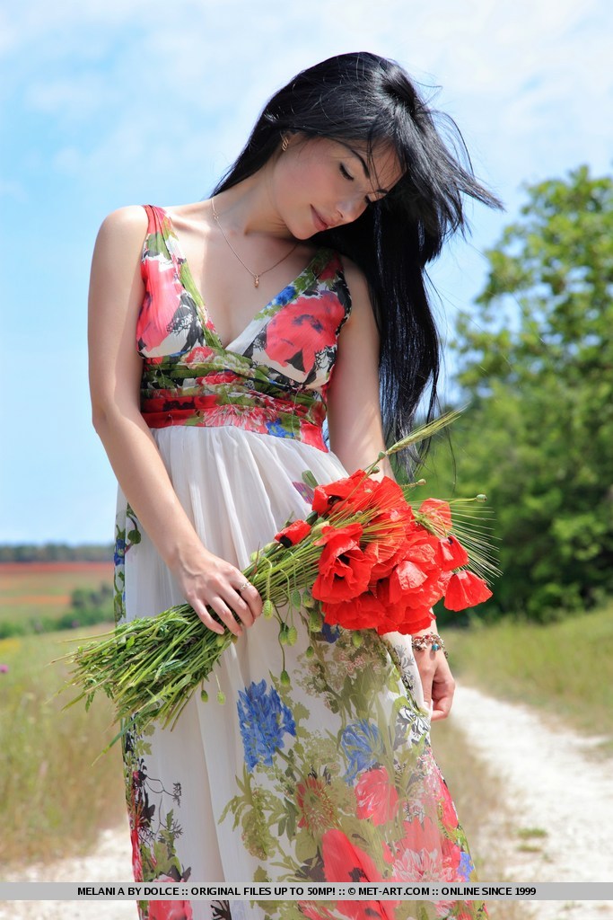 wpid-stunning-fair-skinned-teen-melani-a-nude-showing-her-perfect-ass-in-a-field1.jpg