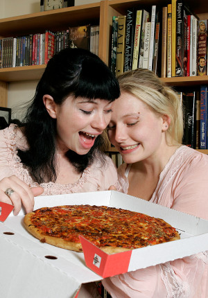chubby young lesbian lovers Leah and Kristin eat pizza and pussy