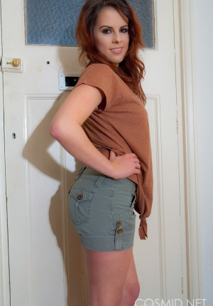 wpid-curvaceous-busty-redhead-jocelyn-teasing-in-her-g-string-by-the-door3.jpg