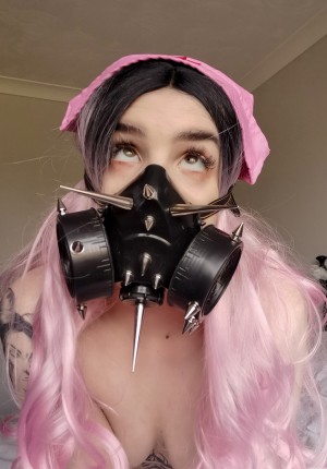 Quarantine gal with pink hair and a hardcore face mask with her tits out