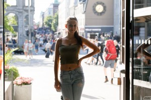 Stunning young babe Jessica Albanka showing her ass on the street then her large tits in the house
