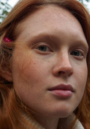 Cute freckled ginger lass Arina Bik teasing in public showing a bit of skin