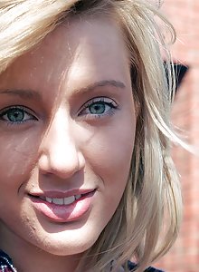 Cute blonde teen Larissa shows her fat pussy lips outside