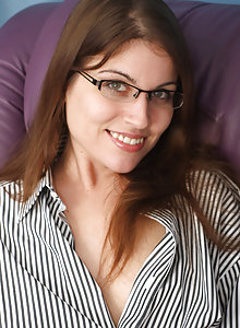 Enough study, Holly cant stop thinking about pulling her panties to the side and rubbing her hairy clit and pussy. Her glasses might fog up!