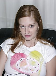 Redhead amateur with puffy nipples Layla posing on the couch