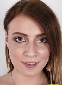 Freckled brunette amateur Klara disrobes for her casting shots