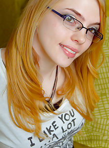 Blonde cutie in glasses Sue Commer shows off her nice breasts