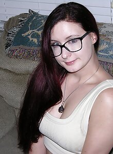 Super cute glasses wearing amateur nerd undresses and poses naked on the bed