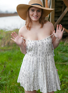 Chubby natural blonde amateur Dallin Thorn removes her sun dress outside to show her giant boobs