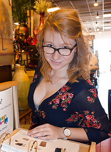 Sexy nerd in glasses Irelynn Dunham lifts up her skirt to show her panties