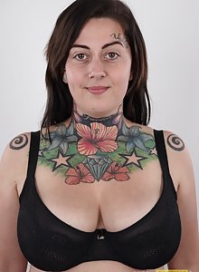 Fat tattooed punk rock girl Nikola gets naked for her porn casting pics